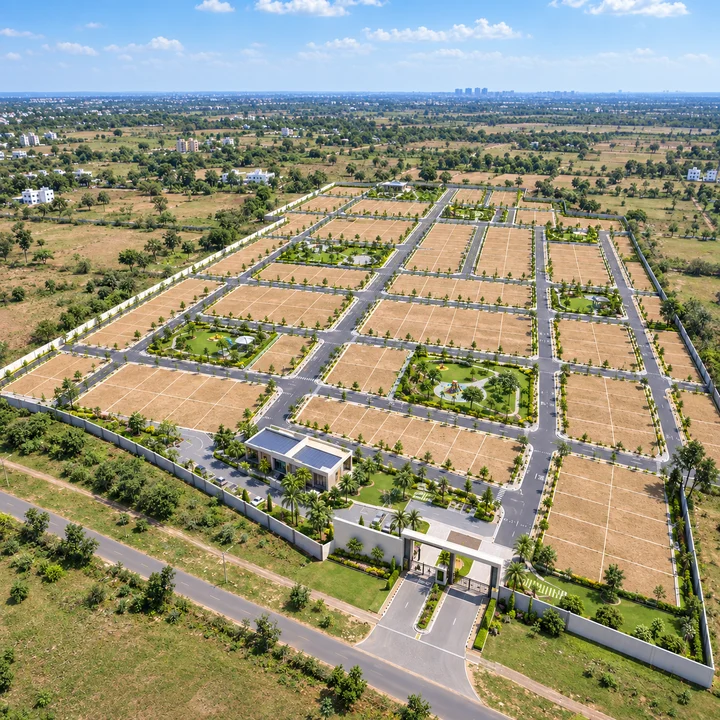 Adarsh Forest Glen aerial view of the 214-plot layout in Gattahalli with internal roads and seven parks Adarsh Forest Glen aerial view of the 214-plot layout in Gattahalli with internal roads and seven parks